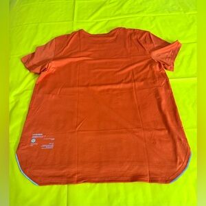 Lululemon Orange workout top with reflectors (L) Excellent condition 10/10.